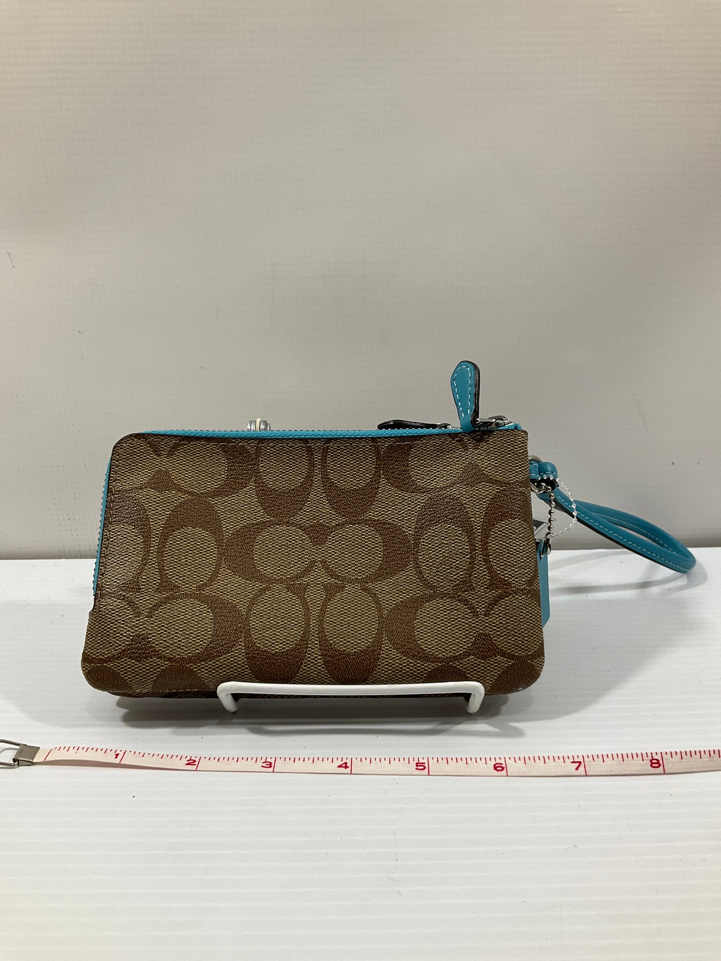 Wristlet Designer By Coach, Size: Medium