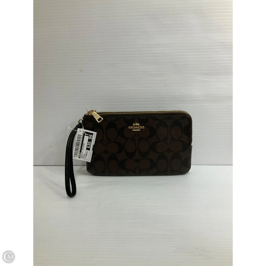 Wristlet Designer By Coach, Size: Medium